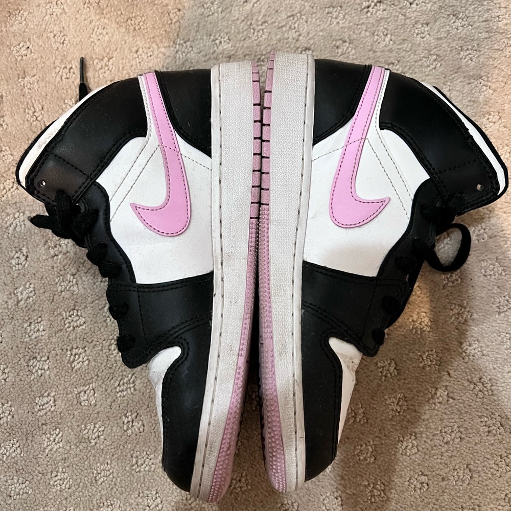 Pink, black, and white Jordan 1